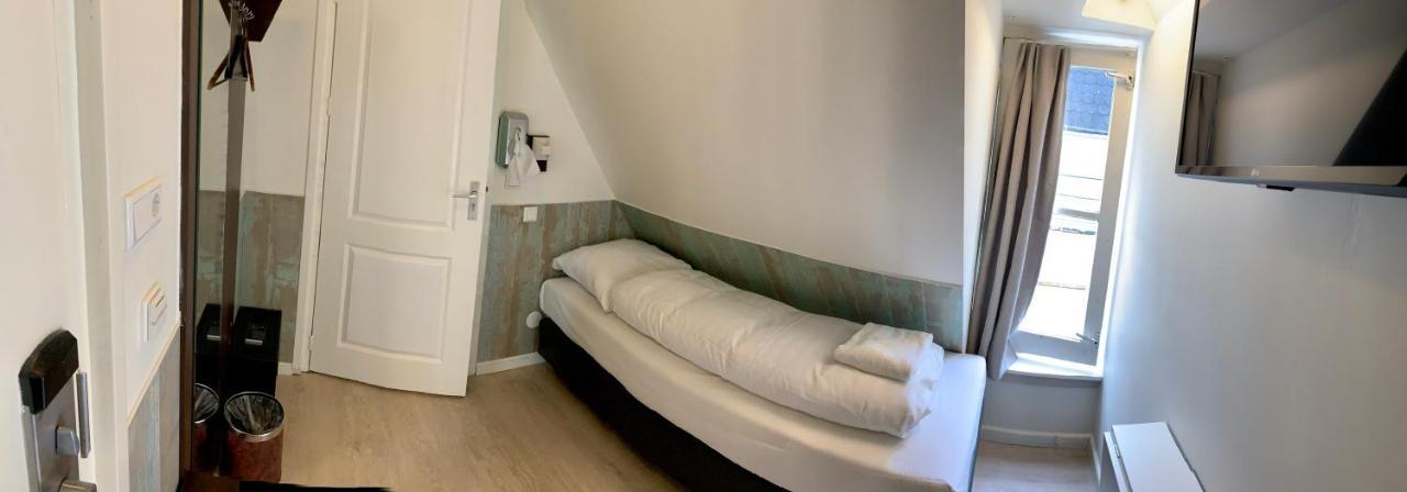 Hotel Damrak Inn Amsterdam Exterior photo