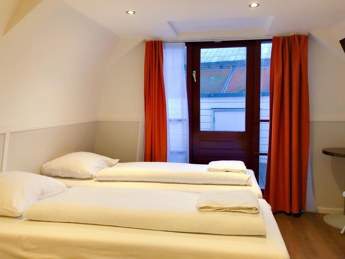 Hotel Damrak Inn Amsterdam Exterior photo